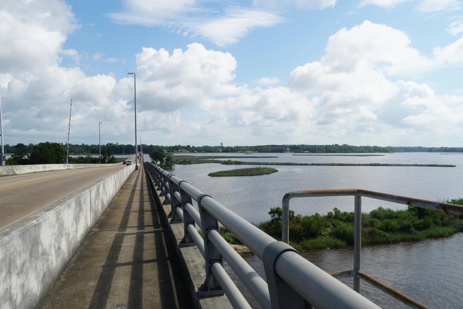 Original camera shot from the return bridge view with the blue Biloxi water tower in the distance